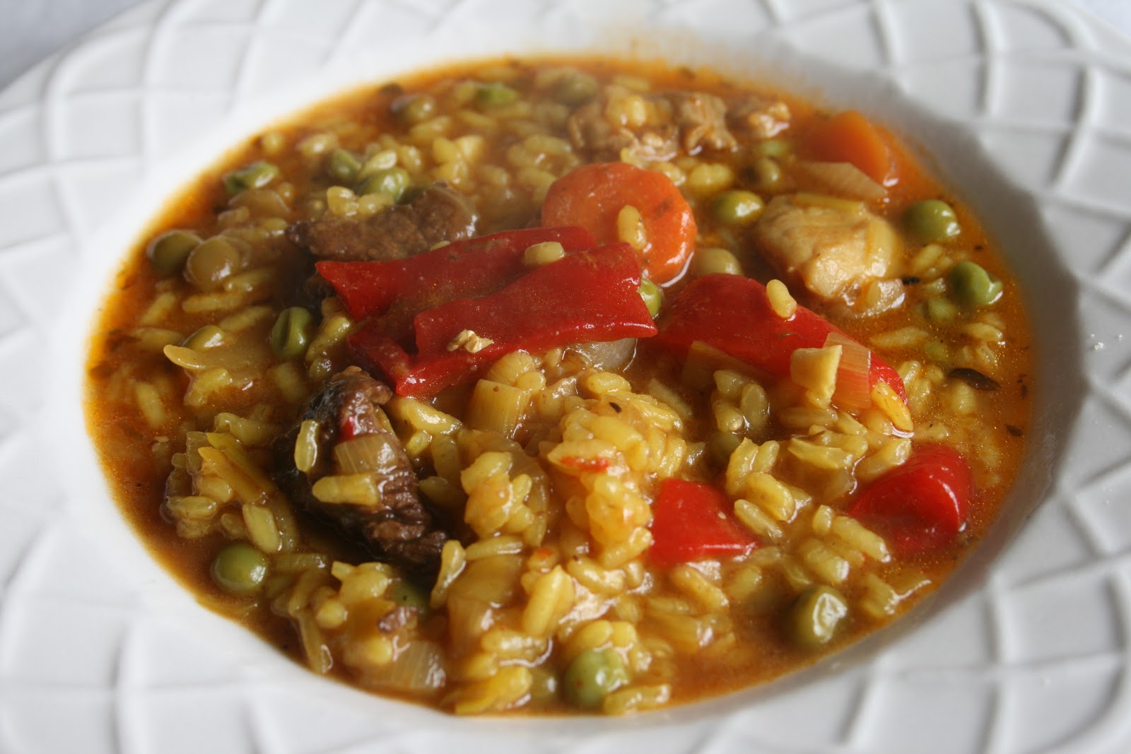 Con facil caldoso hacer pollo arroz como un